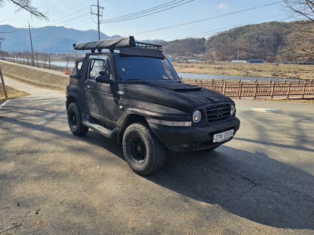 뉴 코란도 KJ 4인승 디젤 TX5 소프트탑 4WD 고급 매물 썸네일