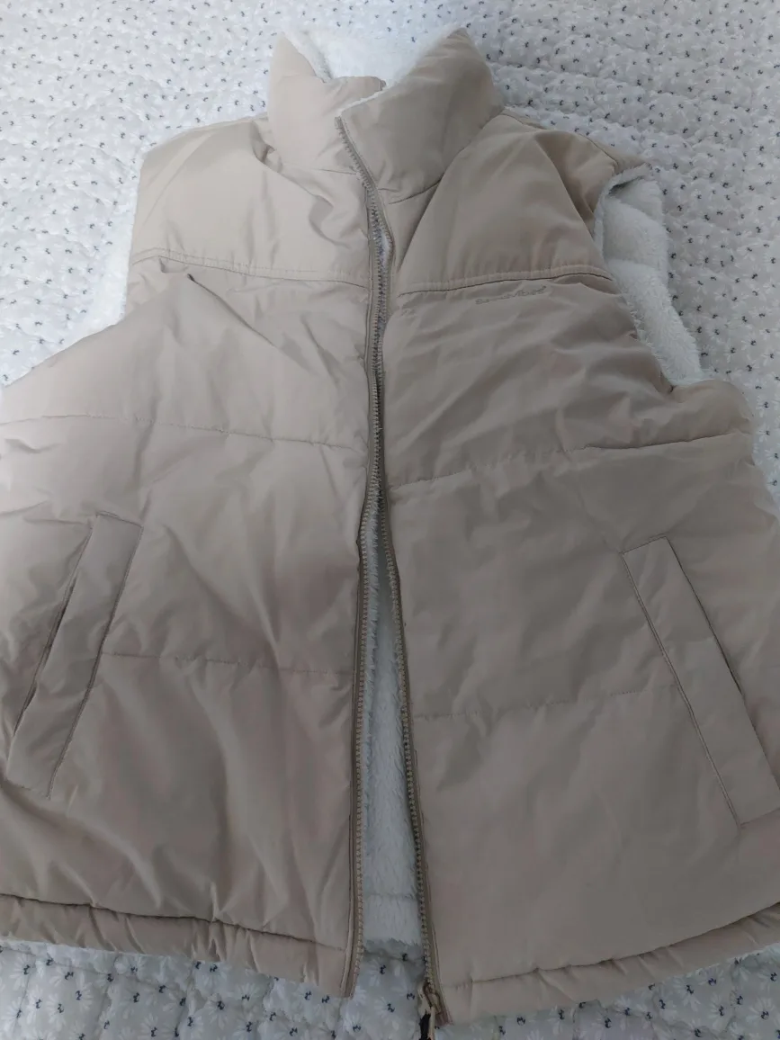 스파오 리버서블 베이지색 양털 조끼 100