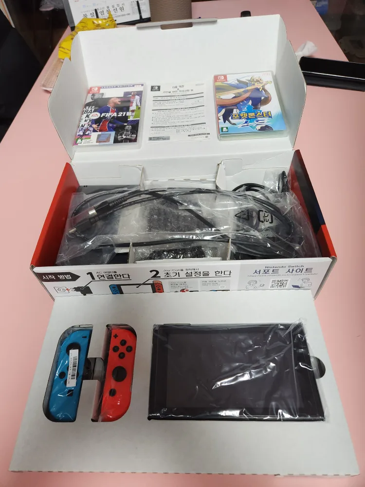 닌텐도 스위치 및 게임칩(포켓몬스터소드,피파21)중고 판매