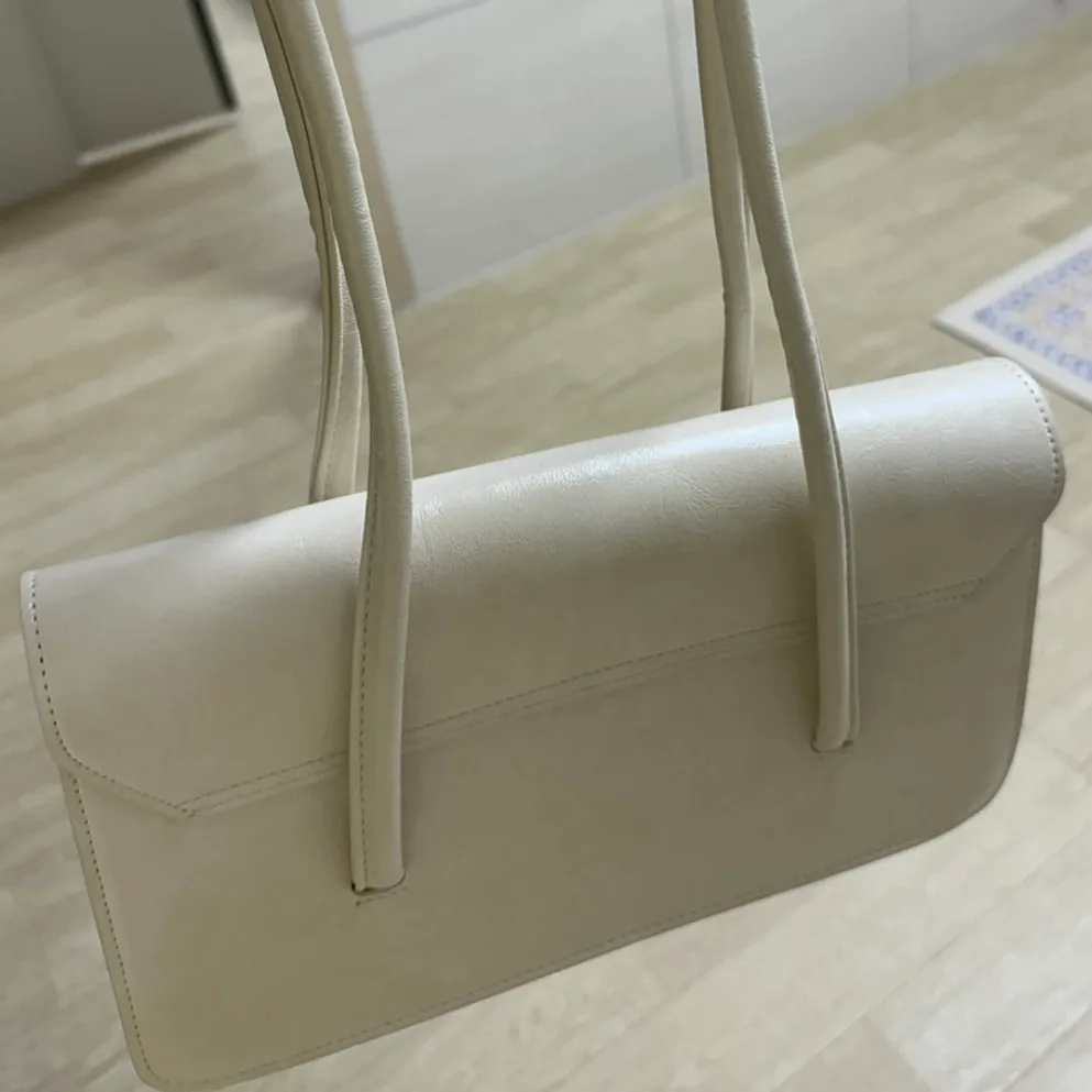 고쎄 아이보리 백