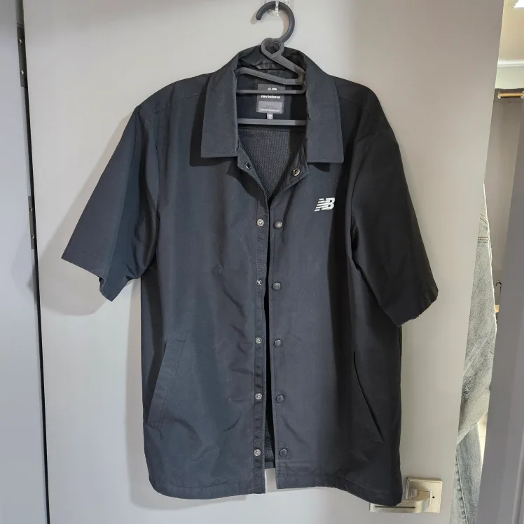 중고  뉴발  코치 자캣 105