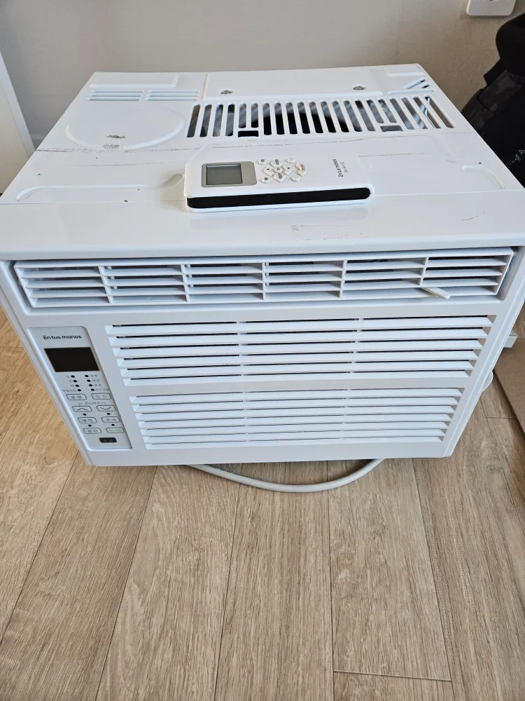 En tus manos 창문형 에어컨