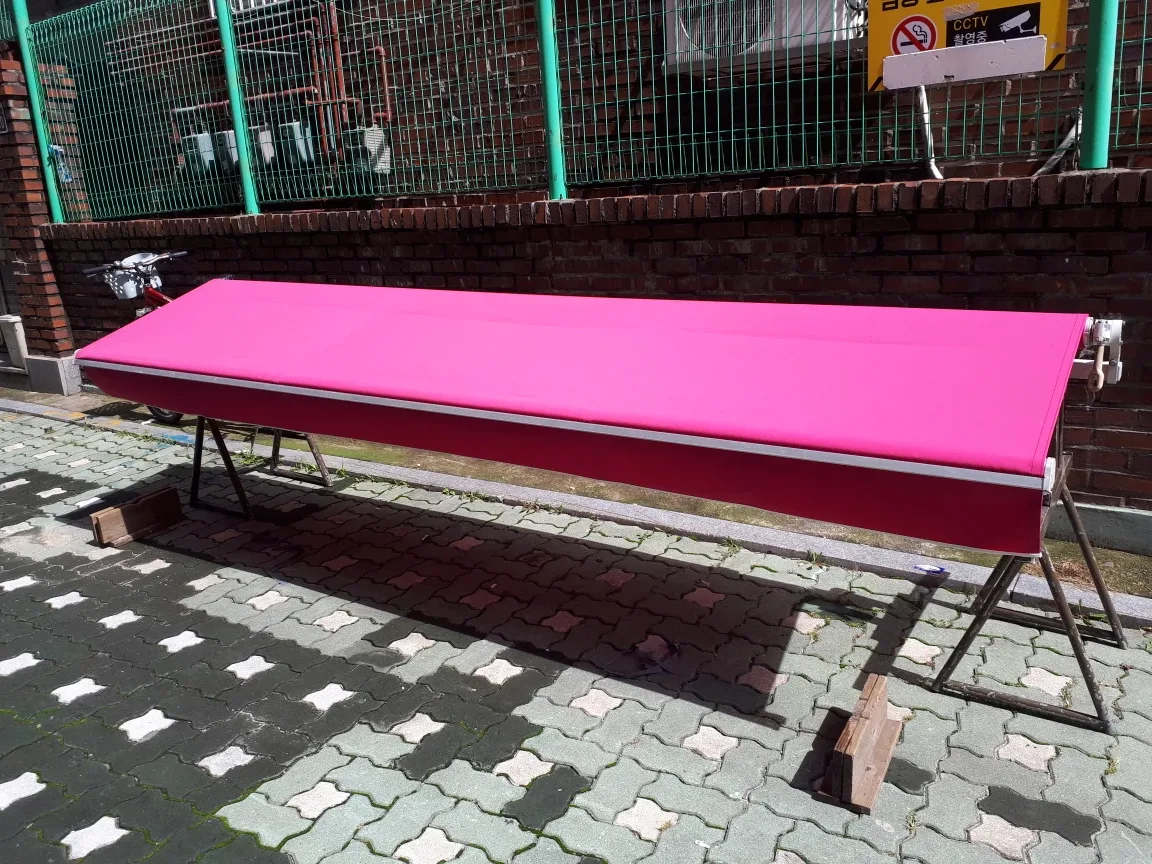 새 천으로 천갈이 된 중고 어닝 3500x1500