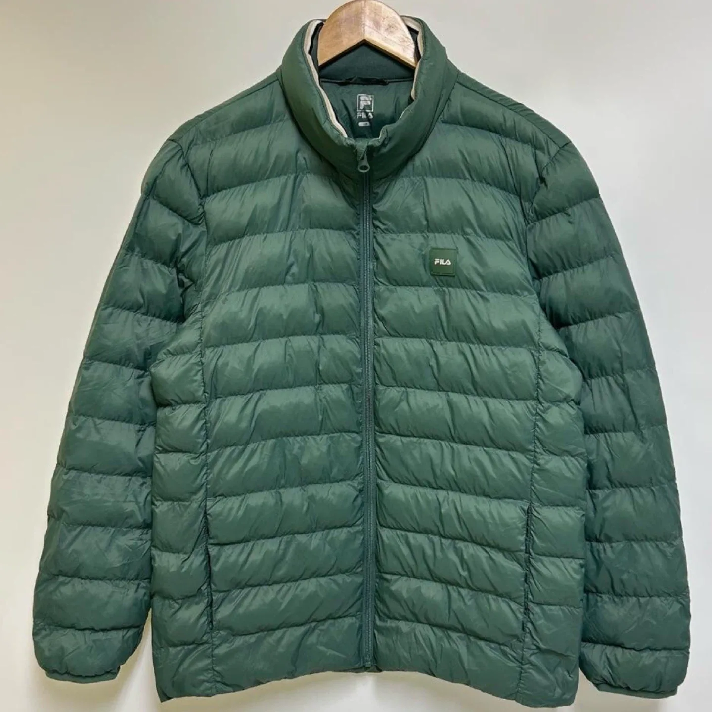 FILA 경량 패딩 100