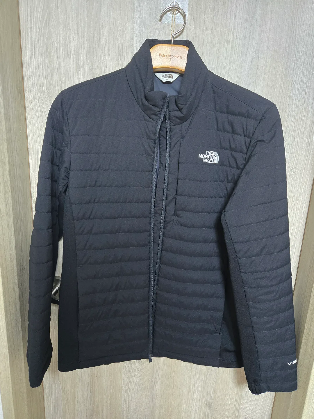 노스페이스 경량패딩 브이모션 간절기용 100
