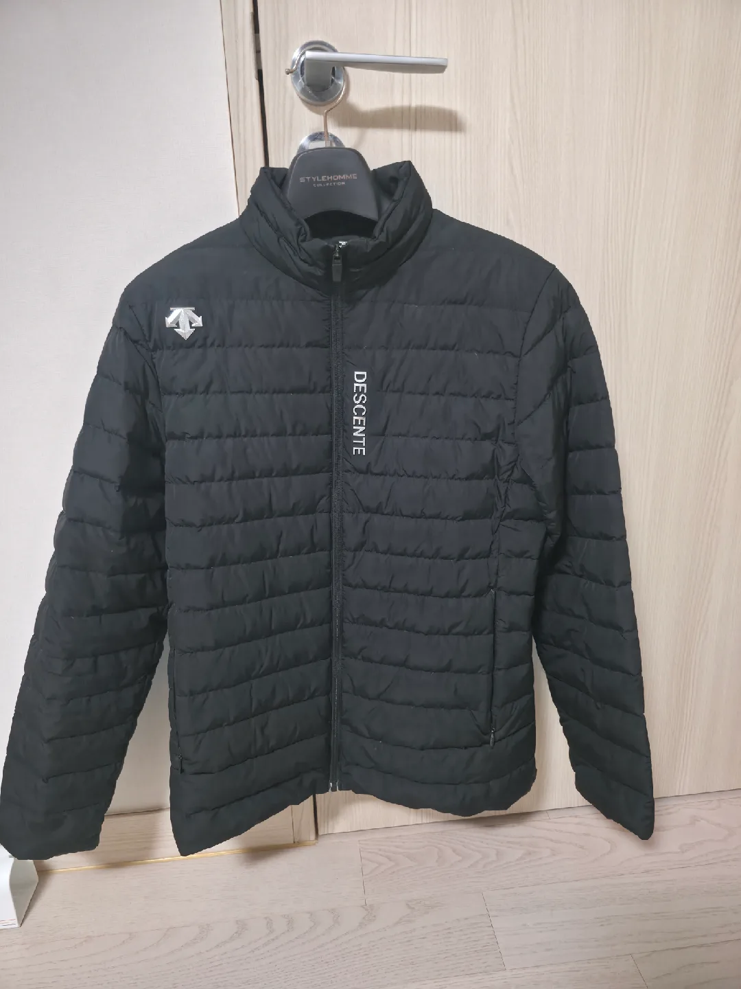 데상트 경량패딩