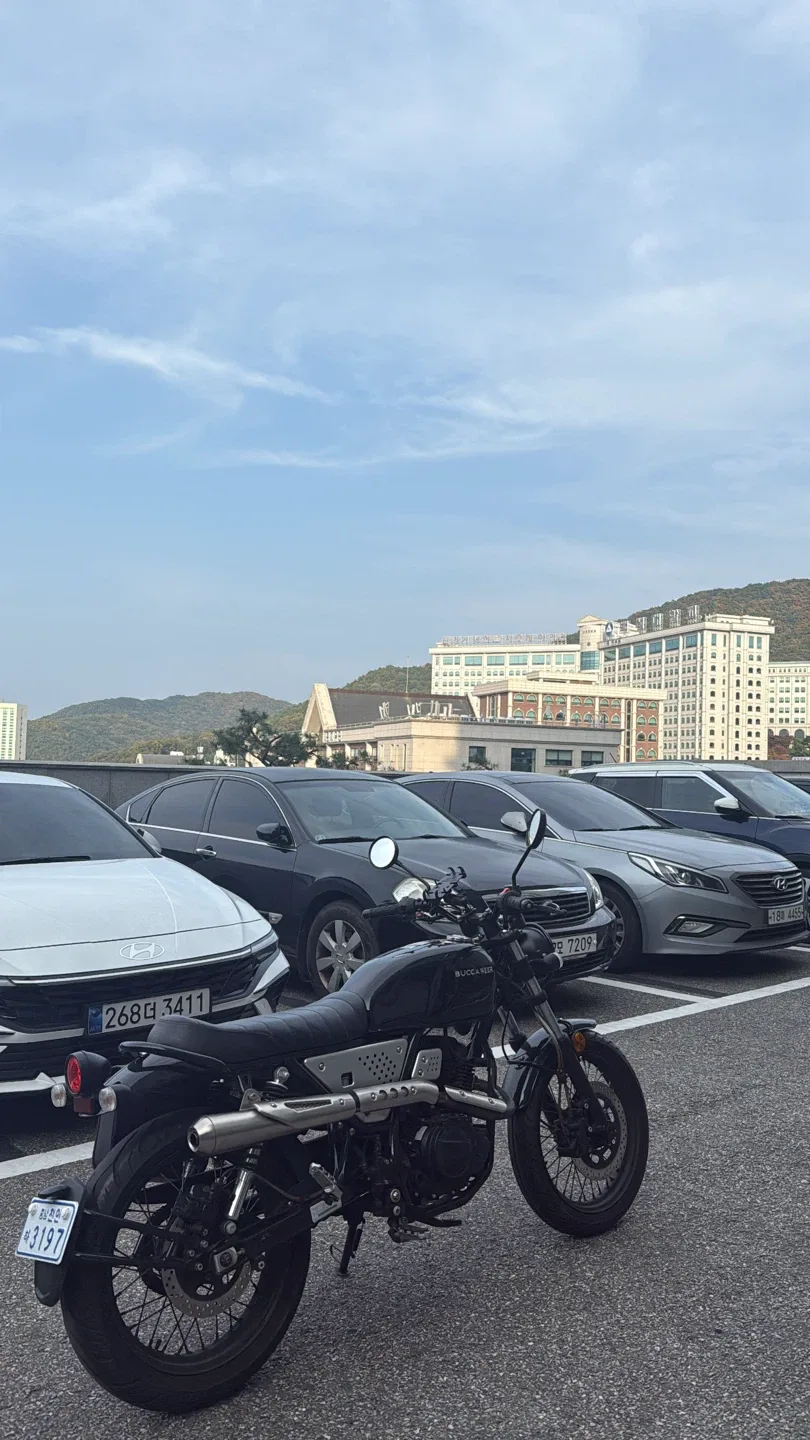 부캐너 125 블랙 오토바이