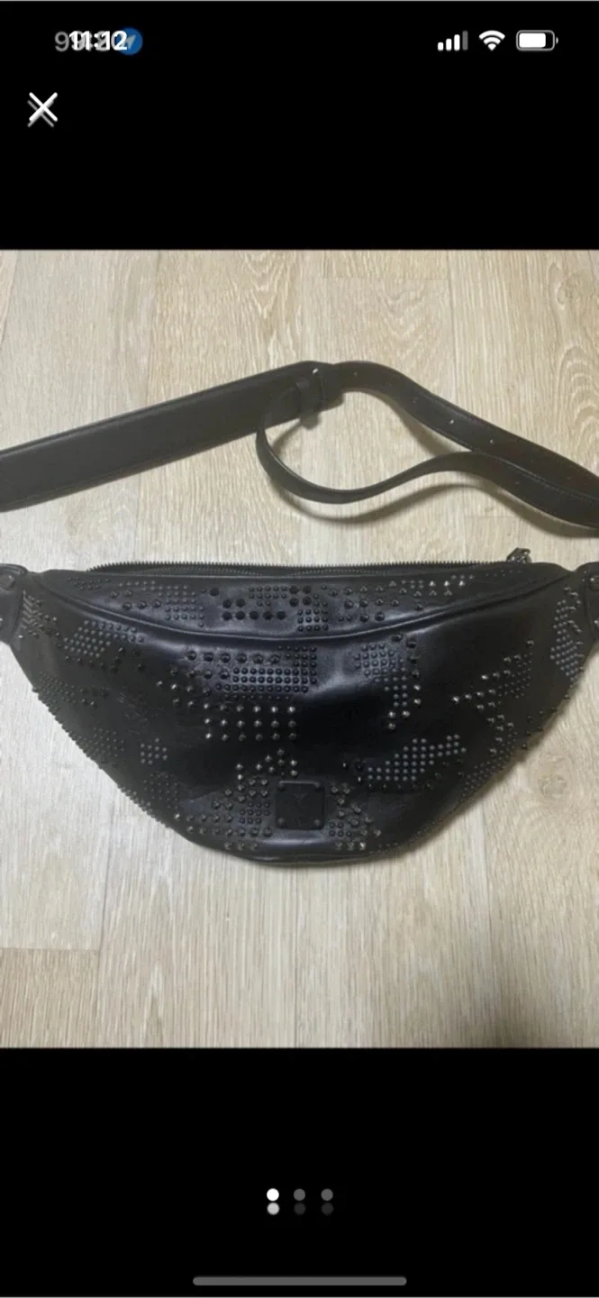 소가죽 앰씨앰 스터드 슬링백 정품케어라벨 확인