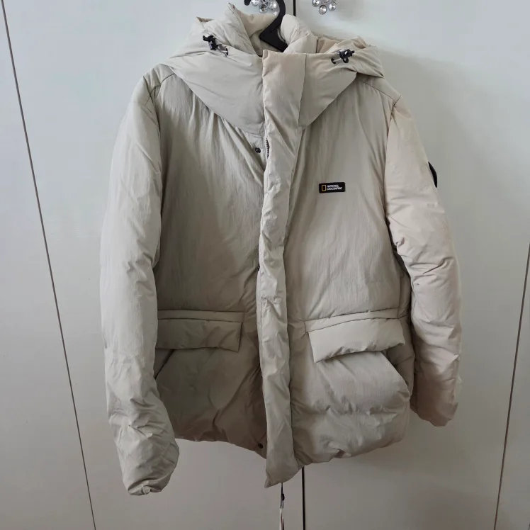 내셔널지오그래픽 베이지 패딩 M