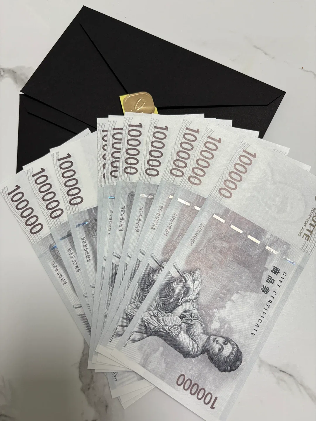 롯데백화점 상품권 10만원권 10장 장당97000원입니다.